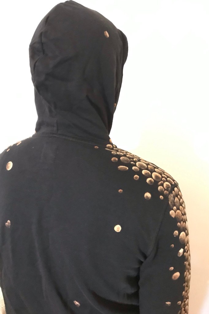 hoodie painted with pebble like bleach design