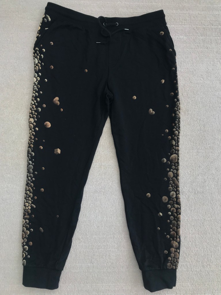 front of cotton trackies painted with bleach