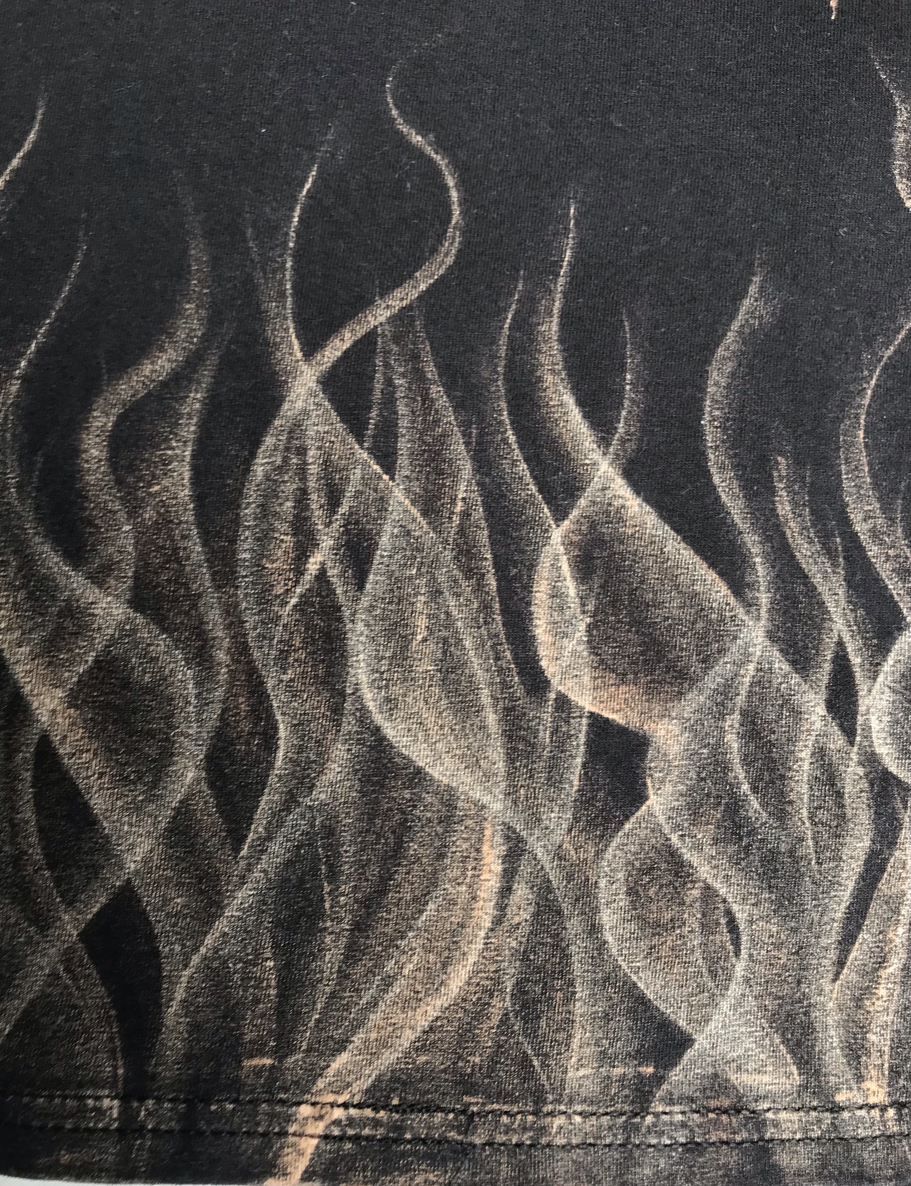 Bleached clothing with flames